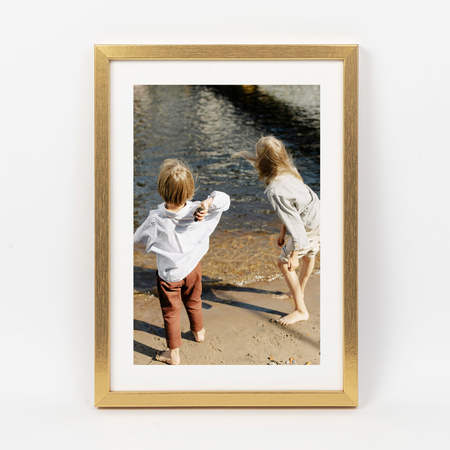 Złota ramka na zdjęcieKEA Z 21x29,7 cm